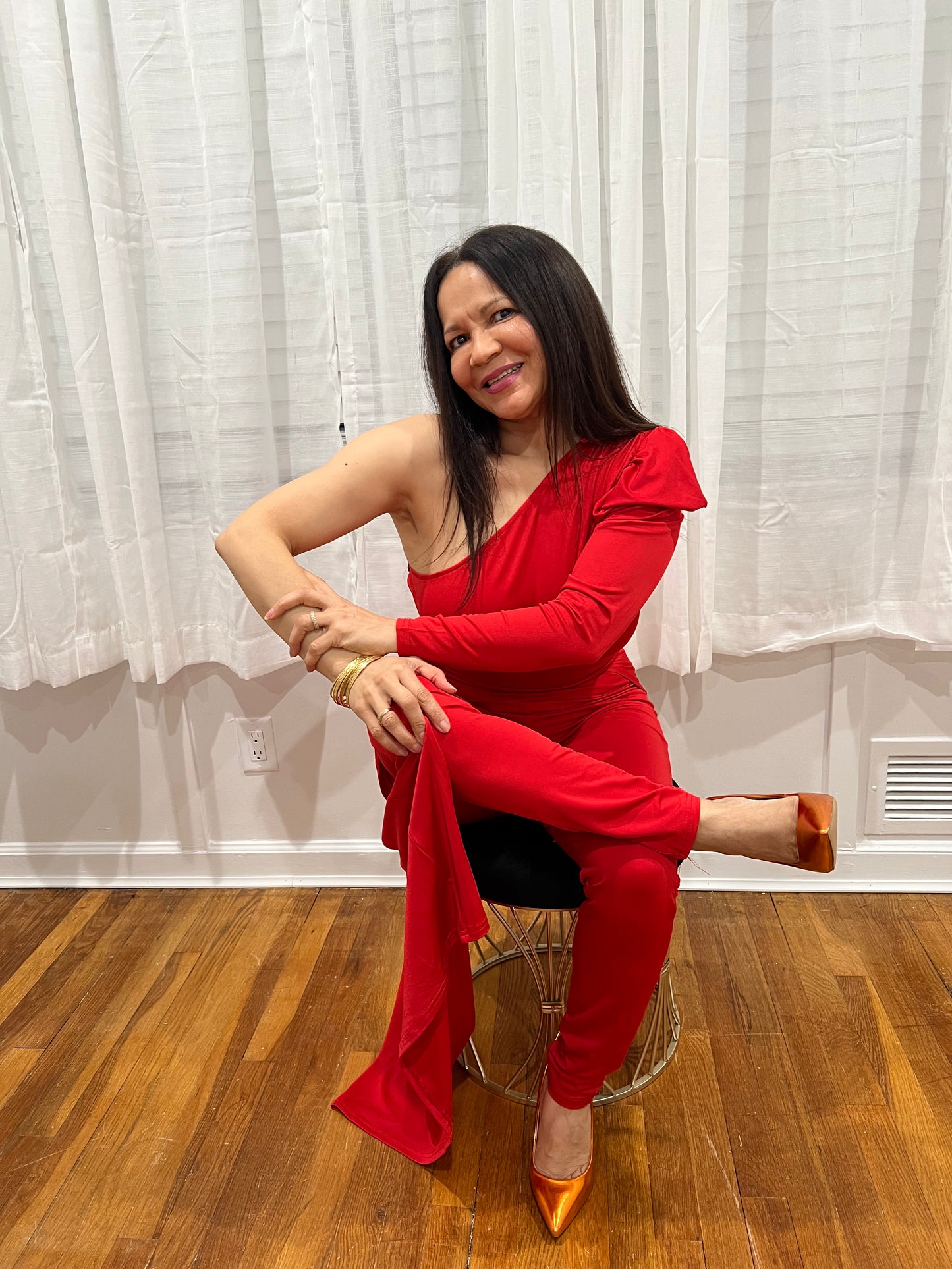 RED JUMPSUIT FOR ALL YEAR AROUND ONE SHOULDER, ONE LONG SLEEVE ONE SHOULDER OUT, SOPHISTICATE, BEAUTIFUL AND SEXY PIECE COLLECTION. GREAT FOR TRAVELING VERY LIGHT.