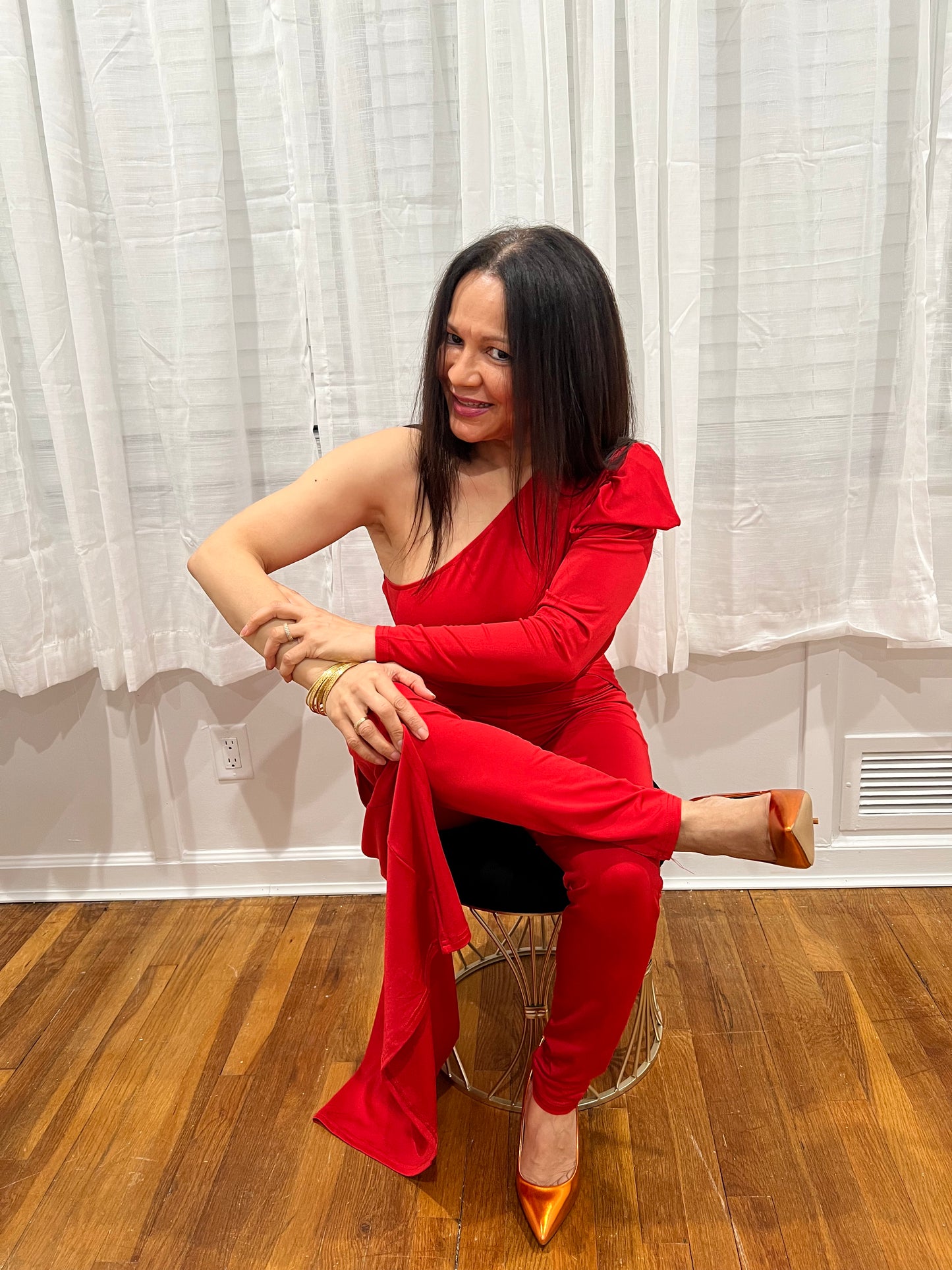 RED JUMPSUIT FOR ALL YEAR AROUND ONE SHOULDER, ONE LONG SLEEVE ONE SHOULDER OUT, SOPHISTICATE, BEAUTIFUL AND SEXY PIECE COLLECTION. GREAT FOR TRAVELING VERY LIGHT.
