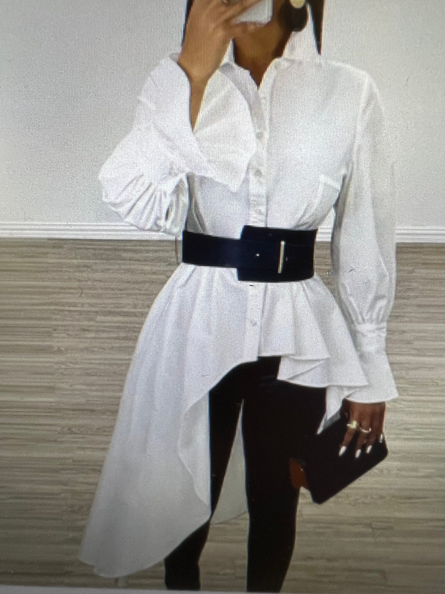 SHIRT WHITE BOTTONS DON SHIRT LONG ON THE BACK AND SHORT ON THE FRONT. LONG SLEEVE AN AMAZING LOOK, FOR ANY OCCOSION, ALL YEAR AROUND, GREAT FOR TRAVELING AS WELL.