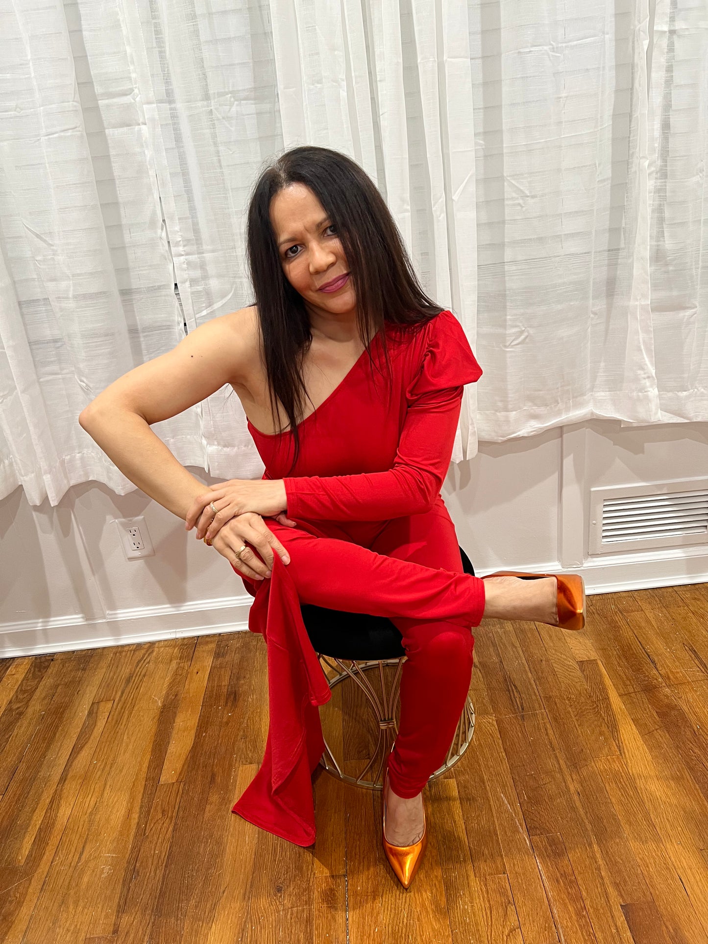 RED JUMPSUIT FOR ALL YEAR AROUND ONE SHOULDER, ONE LONG SLEEVE ONE SHOULDER OUT, SOPHISTICATE, BEAUTIFUL AND SEXY PIECE COLLECTION. GREAT FOR TRAVELING VERY LIGHT.
