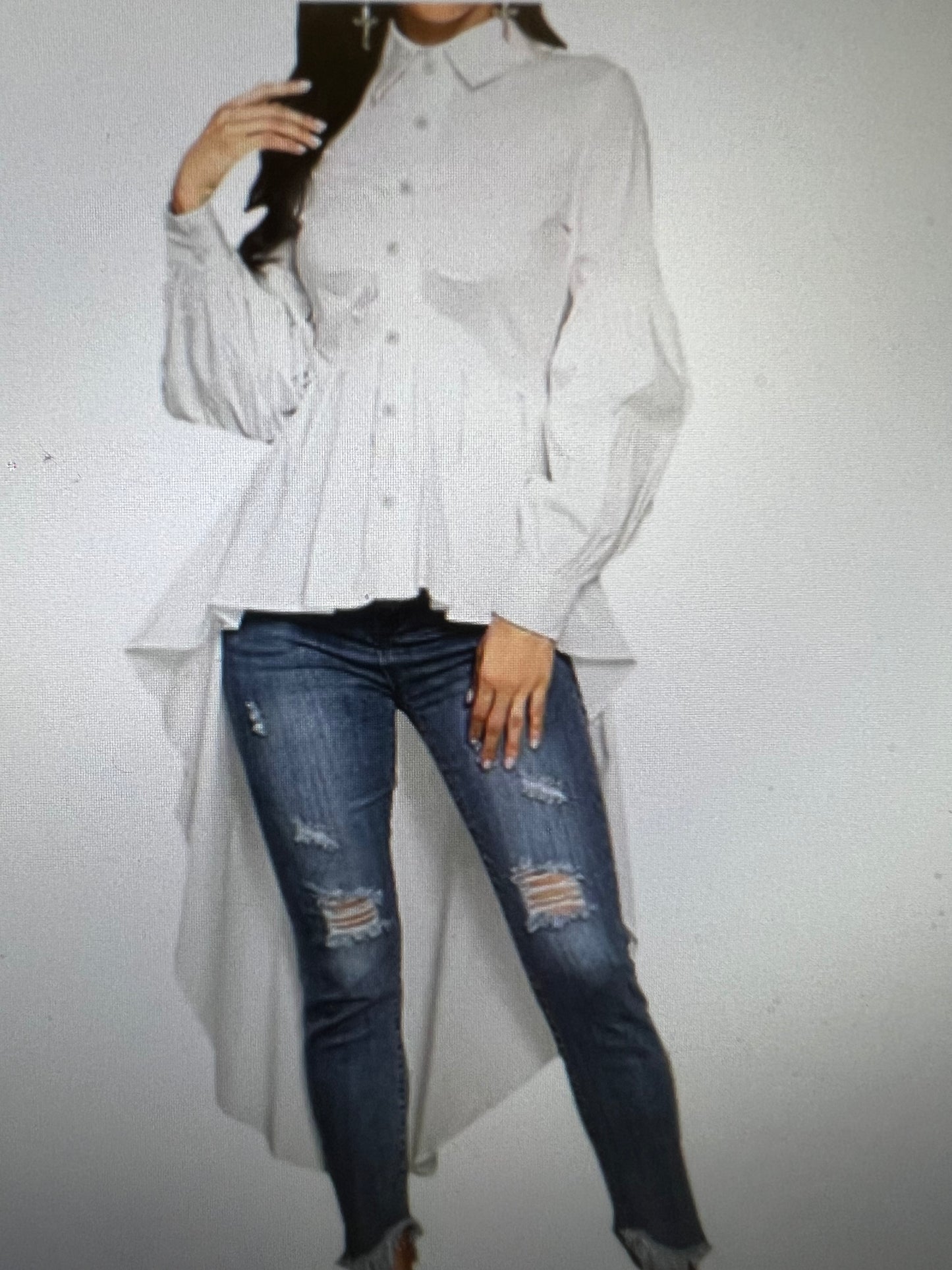 SHIRT WHITE BOTTONS DON SHIRT LONG ON THE BACK AND SHORT ON THE FRONT. LONG SLEEVE AN AMAZING LOOK, FOR ANY OCCOSION, ALL YEAR AROUND, GREAT FOR TRAVELING AS WELL.