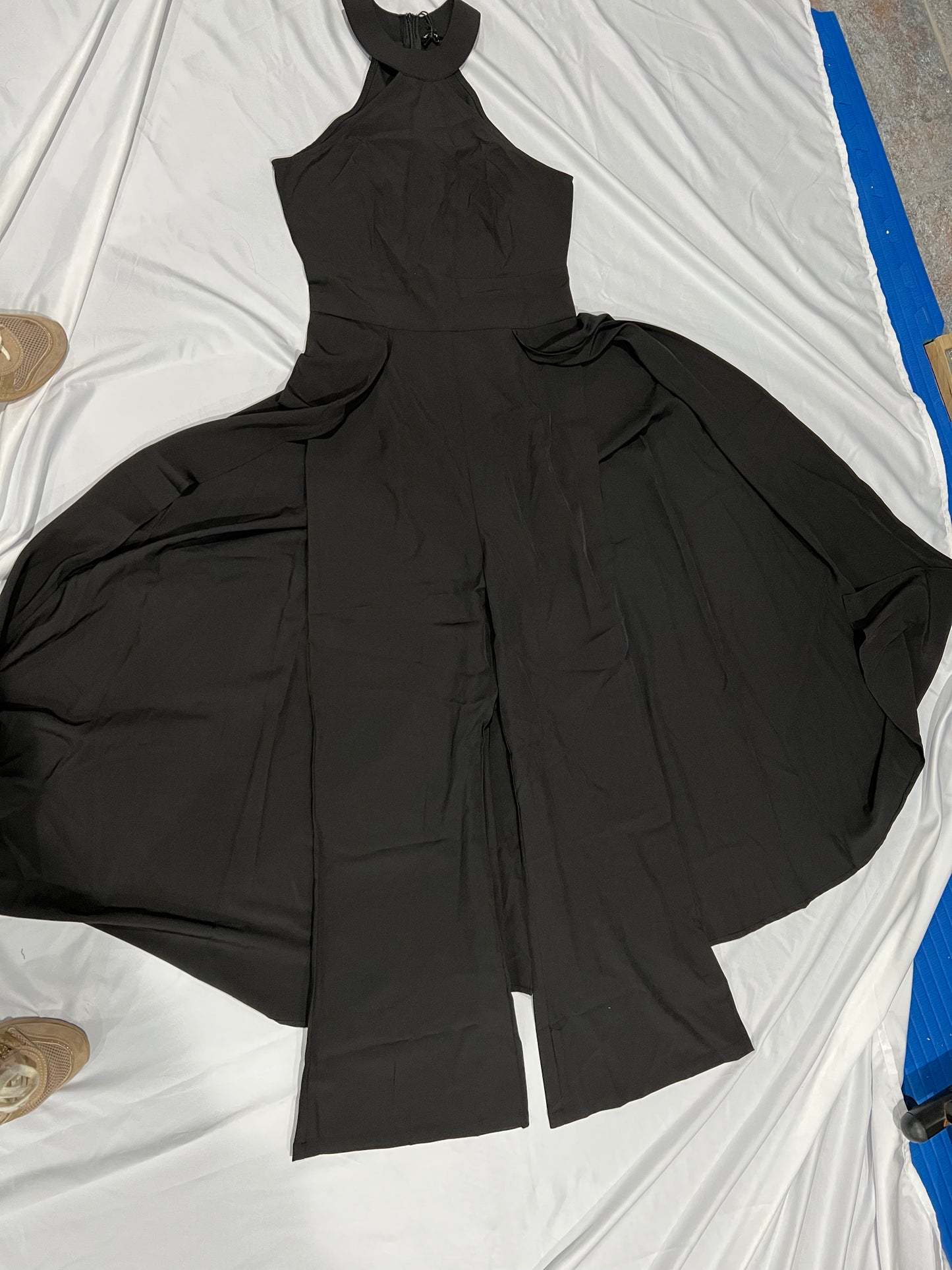 JUMPSUIT BLACK ELEGANT JUMPSUIT, NO SLEEVES, LONG PANTS WITH ATTACHED SKIRT UNIQUE STYLE ON THE BACK.