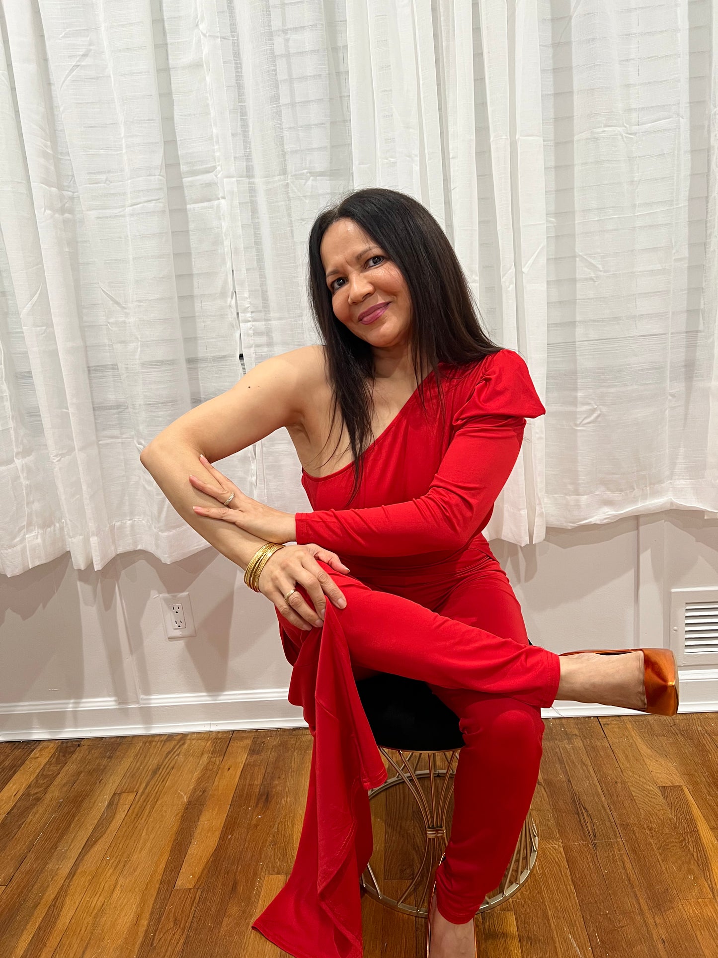 RED JUMPSUIT FOR ALL YEAR AROUND ONE SHOULDER, ONE LONG SLEEVE ONE SHOULDER OUT, SOPHISTICATE, BEAUTIFUL AND SEXY PIECE COLLECTION. GREAT FOR TRAVELING VERY LIGHT.