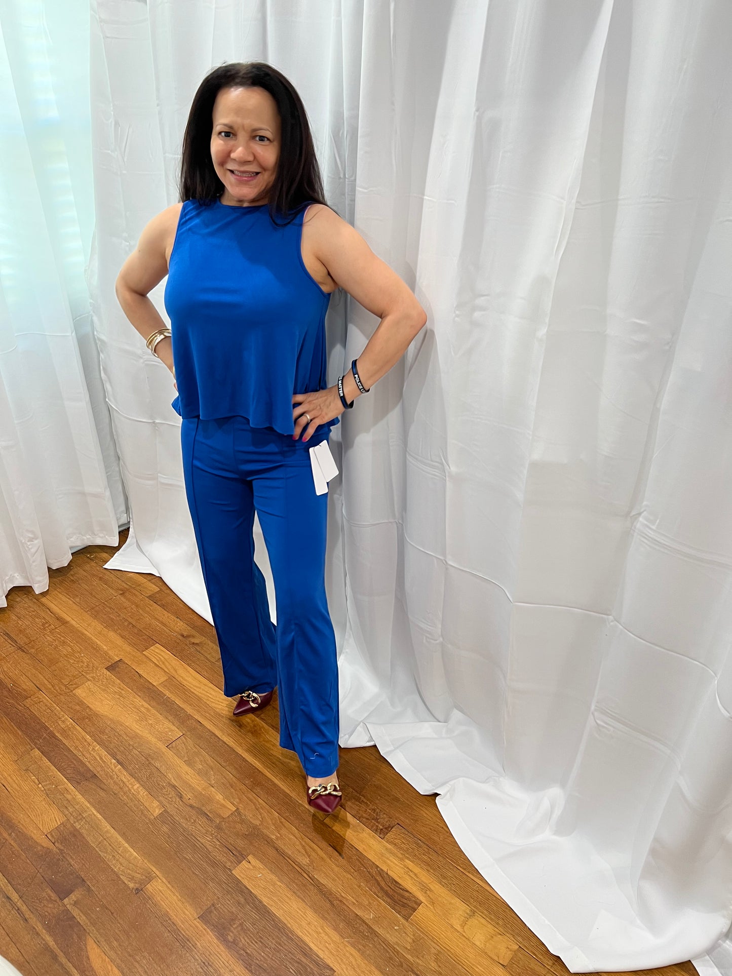 SETS OF LONG PANTS AND NON-SLEVEE TOPS. SOLID COLOR ELEGANT, CASUAL, AND FORMAL